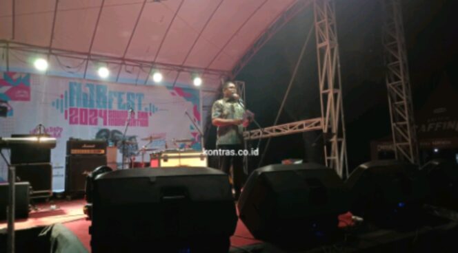 
					Asisten III Pemkot Kotamobagu Hadiri Penutupan AJB Fest 2024: Mendorong Ekonomi Lokal Lewat Kontes Modifikasi Mobil dan Sound System